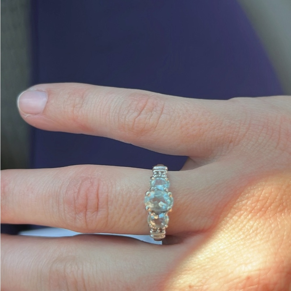Aquamarine ring/ diamonds on the side/ white gold